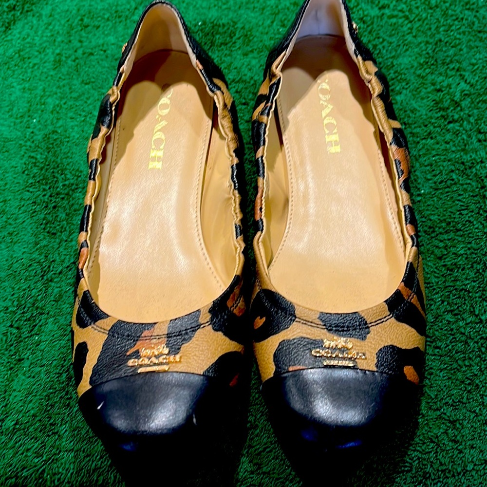 Coach flats.